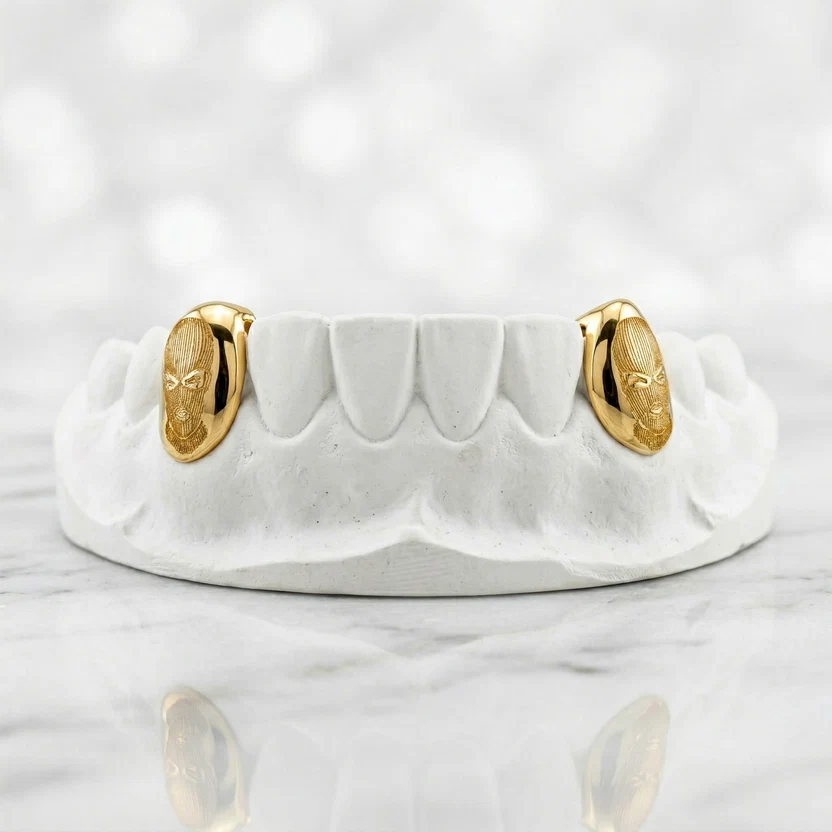 Two Piece Yellow Gold Carved Fang Caps